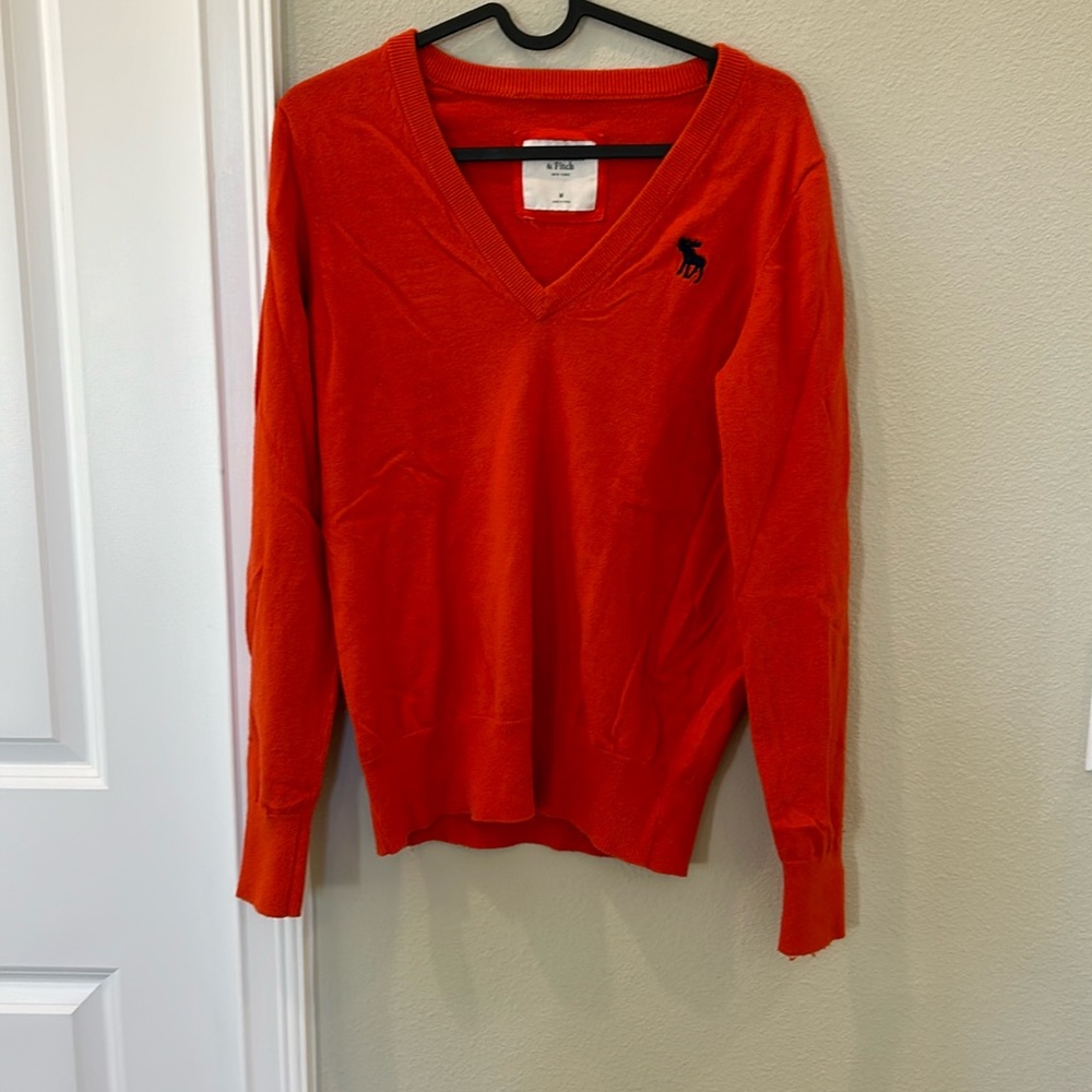 Abercrombie and Fitch Orange V neck sweater (pilling + stain)